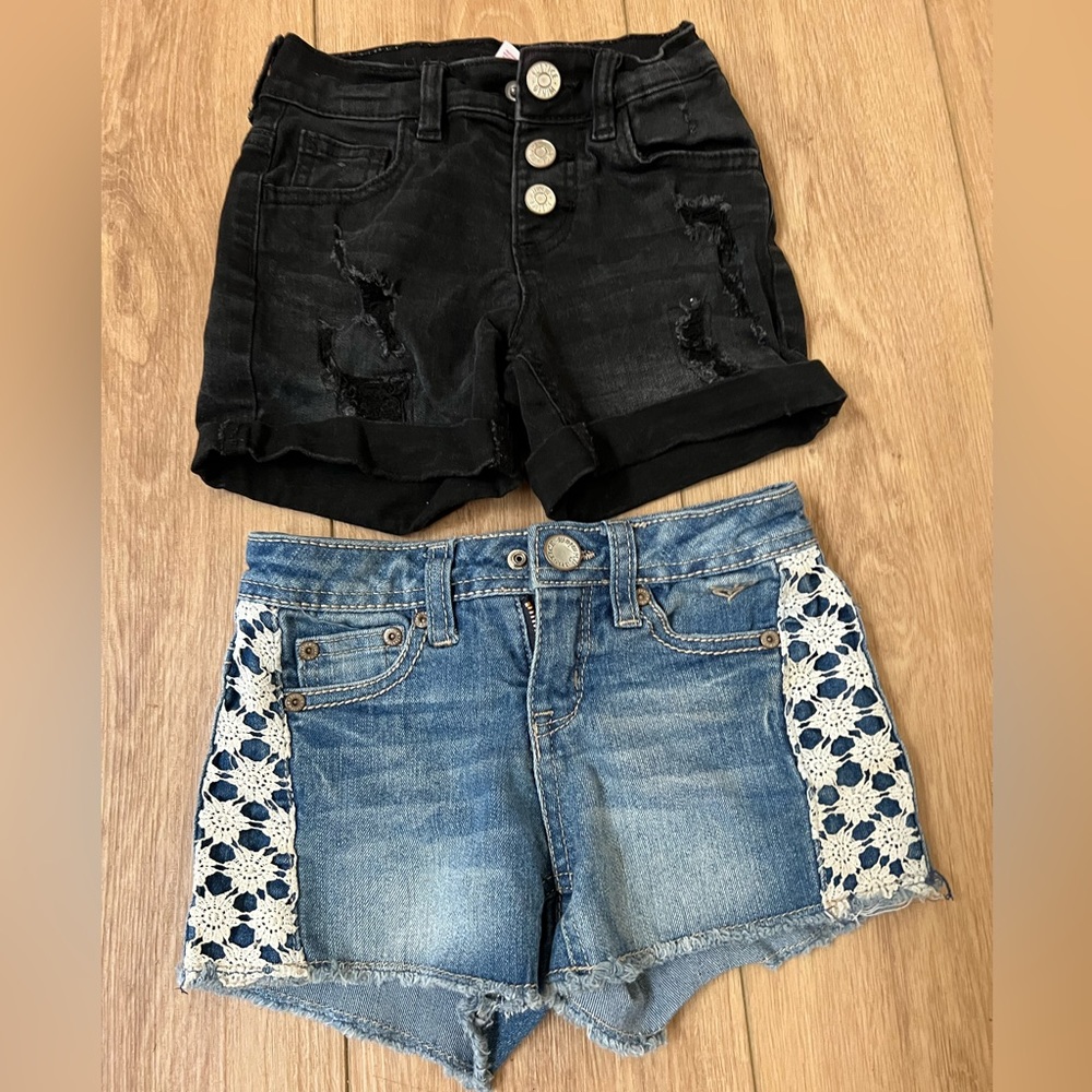 Two pairs of girls justice shorts size 7